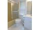 Bathroom featuring toilet, shower with sliding door and modern vanity with sink at 3856 Ne 17Th Street Cir, Ocala, FL 34470