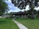 Community pavilion featuring a lush lawn and walkway, ideal for outdoor gatherings at 3856 Ne 17Th Street Cir, Ocala, FL 34470