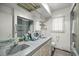 Bathroom with double sinks, lots of counter space, and a shower/tub combo at 4025 Ne 18Th St, Ocala, FL 34470