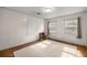 Bedroom featuring hardwood floors, neutral walls, and natural light at 4025 Ne 18Th St, Ocala, FL 34470
