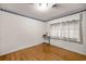 Bedroom featuring hardwood floors, neutral walls, and natural light at 4025 Ne 18Th St, Ocala, FL 34470