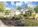 Beautiful single-story home with a neatly landscaped front yard and a spacious two-car garage at 5151 Sw 39Th St, Ocala, FL 34474