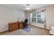 Bright office space with large window, desk, and wood cabinets at 5151 Sw 39Th St, Ocala, FL 34474