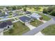 Bird's eye view of a single-story home with a green lawn and white vinyl fencing at 6646 Sw 64Th Ave, Ocala, FL 34476