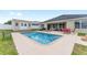 The backyard has a pool, storage shed, and patio seating with lounge chairs at 6646 Sw 64Th Ave, Ocala, FL 34476
