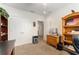 Spacious home office boasts carpet floors, extra storage, and ample room for a workstation at 6646 Sw 64Th Ave, Ocala, FL 34476