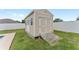 Exterior view of backyard shed with ramp and double doors for easy access at 6646 Sw 64Th Ave, Ocala, FL 34476