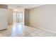 Clean bedroom with tile flooring, large closet, and a bright window at 70 Sapphire Rd, Ocala, FL 34472
