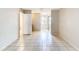 Neutral bedroom boasts tile floors, closet, and a convenient adjoining vanity area at 70 Sapphire Rd, Ocala, FL 34472