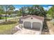 Traditional single-Gathering home with a two-car garage and chain-link fenced yard at 70 Sapphire Rd, Ocala, FL 34472