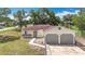 Inviting single-story home with a 2-car garage and a chain-link fence for added privacy and security at 70 Sapphire Rd, Ocala, FL 34472
