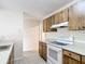 Efficient kitchen features bright countertops, updated appliances, and abundant cabinetry at 70 Sapphire Rd, Ocala, FL 34472
