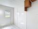 The sunroom features tile flooring and a window at 70 Sapphire Rd, Ocala, FL 34472