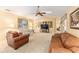 Large living room with vaulted ceilings and a ceiling fan creating a relaxing atmosphere at 8554 Sw 63Rd Ct, Ocala, FL 34476