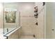Spacious bathroom featuring a walk-in shower with built-in shelving at 9158 Sw 65Th Loop, Ocala, FL 34481