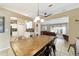 Charming dining area open to a modern kitchen and cozy living room at 9420 Ne 12Th Ct, Ocala, FL 34479