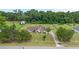 Charming single-Gathering home featuring a large front yard, mature trees, and traditional architecture at 9420 Ne 12Th Ct, Ocala, FL 34479