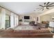 Comfortable living room with a large window offering ample natural light and stylish decor at 9420 Ne 12Th Ct, Ocala, FL 34479