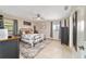 Cozy main bedroom showcasing natural light, neutral decor, and comfortable furnishings at 9420 Ne 12Th Ct, Ocala, FL 34479