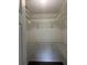 Walk-in closet with wire shelving and dark hardwood floors at 9722 Sw 95Th Ct # C, Ocala, FL 34481