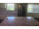 Kitchen includes stainless steel appliances, granite countertops, and an island with seating at 9722 Sw 95Th Ct # C, Ocala, FL 34481