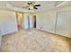 Large bedroom featuring a trey ceiling and natural light at 10405 Sw 47Th Ave, Ocala, Florida, FL 34476
