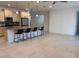 Spacious open-concept kitchen features a large island with seating and modern appliances at 10584 Sw 91St Street Rd, Ocala, FL 34481