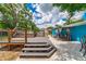 Multi-tiered wooden deck and patio offering ample space for entertaining and relaxation at 1404 Richmond Rd, Lakeland, FL 33801