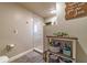 Bathroom with a tiled shower, pebble floor, and decor at 1404 Richmond Rd, Lakeland, FL 33801