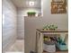 Bathroom with a tiled shower, pebble floor, and decor at 1404 Richmond Rd, Lakeland, FL 33801