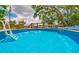 Inviting in-ground swimming pool with crystal-clear water, perfect for relaxation and recreation at 1404 Richmond Rd, Lakeland, FL 33801