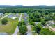 Residential neighborhood featuring lush greenery and well-maintained homes at 1553 Ne 161St Pl, Citra, FL 32113