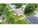 Aerial view of a home showing the backyard with a white fence and lawn at 1553 Ne 161St Pl, Citra, FL 32113