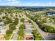 Inviting home with mature landscaping, nestled among tree-lined streets and well-maintained lawns at 1584 Silhouette Dr, Clermont, FL 34711