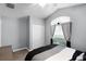 Bedroom with modern decor, vaulted ceiling, closet and large window with plenty of natural light at 1584 Silhouette Dr, Clermont, FL 34711
