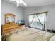 Cozy bedroom with a ceiling fan, a wooden dresser, and a queen-size bed at 1584 Silhouette Dr, Clermont, FL 34711