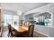 Spacious dining room flowing into the living area, offering a seamless entertainment space at 1584 Silhouette Dr, Clermont, FL 34711