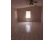 Bright bedroom featuring tile flooring and a window letting in natural light at 2426 Maple Ave, Sanford, FL 32771