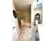 Bathroom featuring a walk-in shower, soaking tub, and tiled flooring at 2550 Sw Ivy Pl, Dunnellon, FL 34431