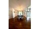 Elegant dining room with hardwood floors and decorative lighting at 2550 Sw Ivy Pl, Dunnellon, FL 34431