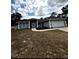 Charming single-story home with a well-manicured lawn and a two-car garage at 2550 Sw Ivy Pl, Dunnellon, FL 34431