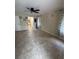 Spacious living room featuring tile floors, large window, and neutral paint at 2550 Sw Ivy Pl, Dunnellon, FL 34431