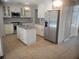Beautiful kitchen with granite countertops, white cabinets, and stainless steel appliances at 3223 Sw 41St Ave, Ocala, FL 34474