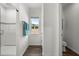 Hallway bathroom with a glass-enclosed shower and modern fixtures at 358 Irving Bend Dr, Groveland, FL 34736