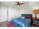 Bedroom featuring ceiling fan, carpet and closet at 358 Irving Bend Dr, Groveland, FL 34736
