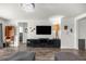 Bright living room showcasing hardwood floors, recessed lighting, and view of decor at 358 Irving Bend Dr, Groveland, FL 34736