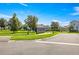 Neighborhood street view showing well-manicured lawns and community mailboxes at 358 Irving Bend Dr, Groveland, FL 34736