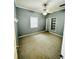 This bedroom has neutral walls, carpet flooring, and built-in shelving at 3610 Sw 25Th Pl, Ocala, FL 34474