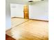 Spacious living area featuring hardwood floors and tile flooring, perfect for entertaining guests at 3610 Sw 25Th Pl, Ocala, FL 34474