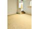 Carpeted living area featuring cozy carpeting and natural light, perfect for comfortable living at 3610 Sw 25Th Pl, Ocala, FL 34474